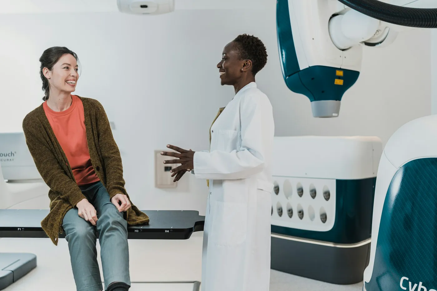 A clinician speaking with a patient